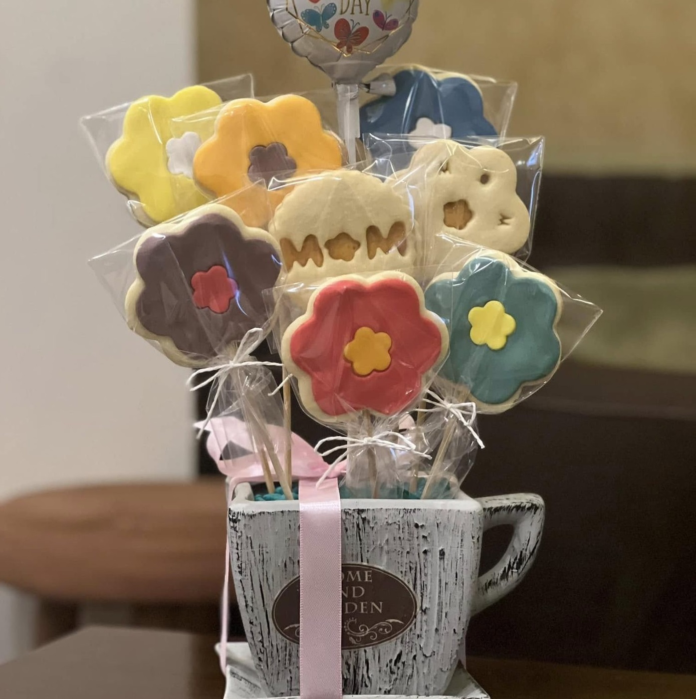 Finished gold-script anniversary cookies